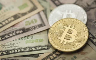 استقرار الدولار وانخفاض العملات المشفرة
