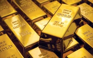 الذهب يتراجع مع إشارات متشددة من الفيدرالي الأميركي
